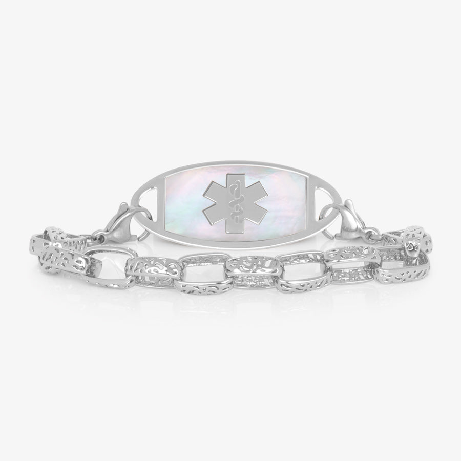 Silver tone women&#39;s medical ID bracelet with cutout detail oval chain links paired with stainless steel ID tag with mother of pearl inlay and silver tone medial symbol.