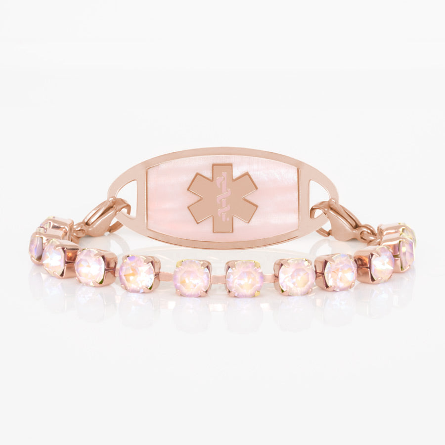 Dusty rose cubic zirconia crystals set in a rose gold plated chain are paired with rose gold tone medical ID tag with pink mother of pearl inlay and rose gold tone medical symbol.