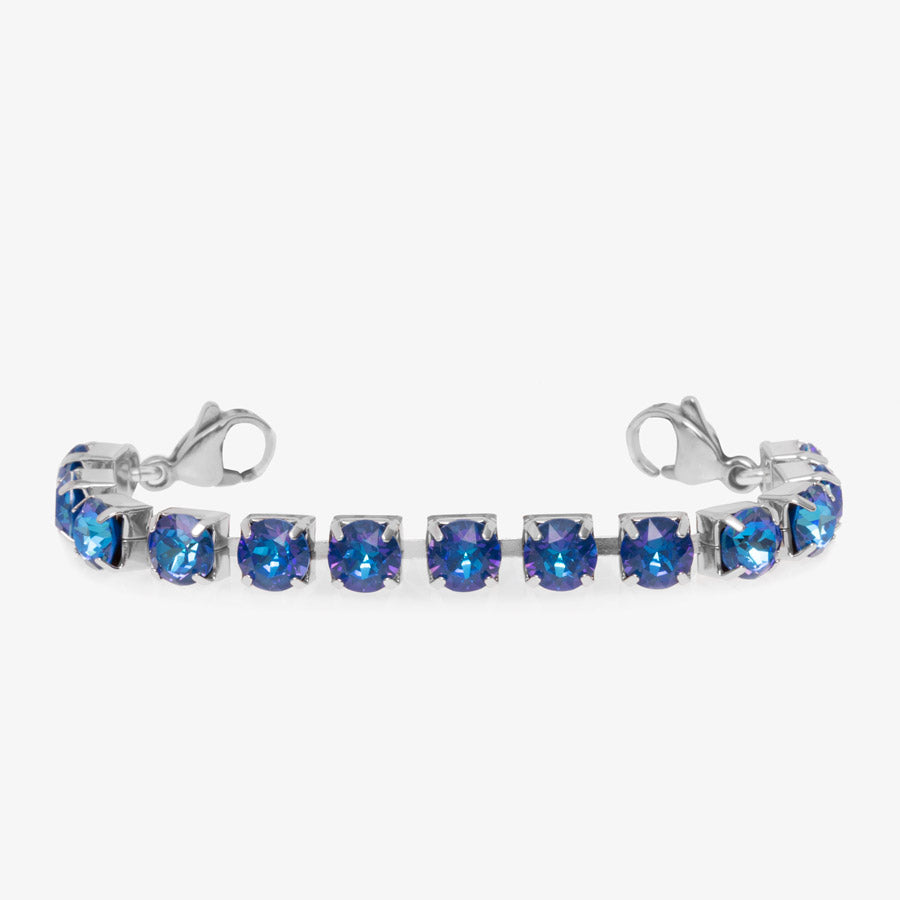 6 mm royal blue crystals set in a silver tone box chain tennis medical ID bracelet with stainless steel lobster clasps at each end.