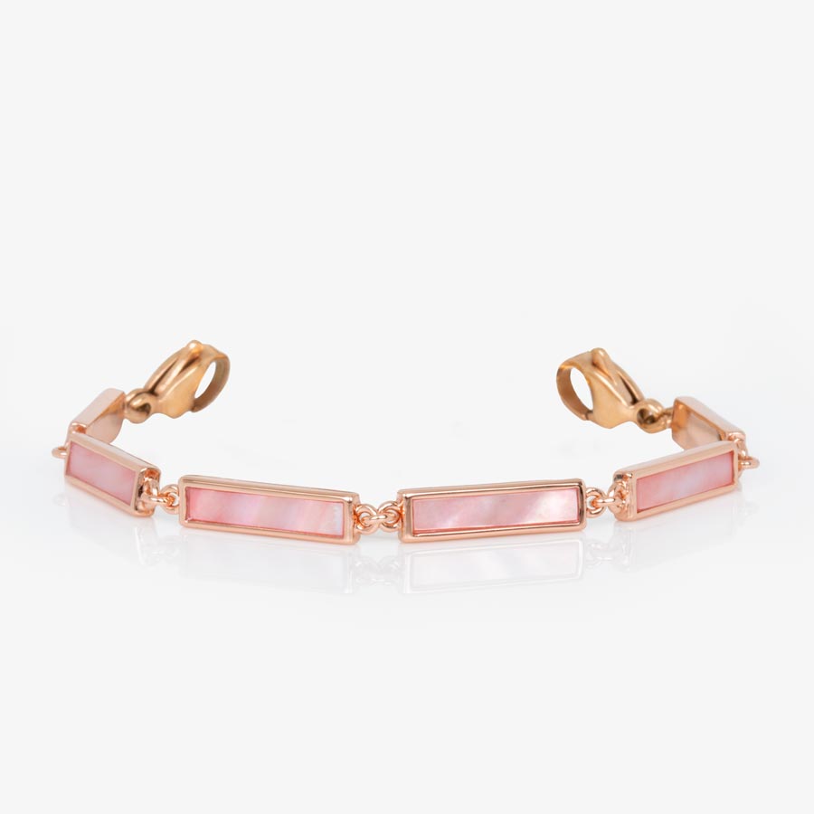 Rose gold tone bar link bracelet with pink mother of pearl inlay finished with rose gold tone lobster clasps at each end of the bracelet.