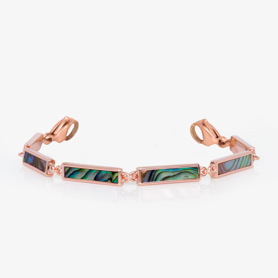 Rose gold tone bar link bracelet with natural abalone inlay and rose gold tone lobster clasps on each end of the bracelet.