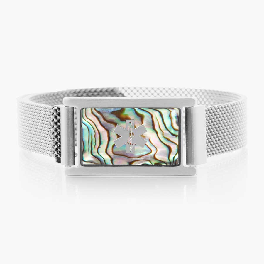 Stainless steel mesh band with magnetic clasp and affixed medical ID tag with abalone inlay and silver medical symbol.