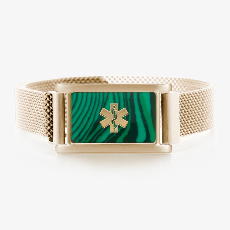 Brushed sandstone, stainless steel mesh band with imitation malachite and gold tone medical symbol. 