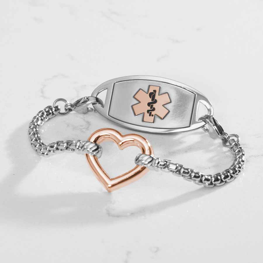 Silver Medical ID box chain bracelet with a rose gold open heart charm and stainless steel medical ID tag in silver featuring a rose gold Medical symbol.