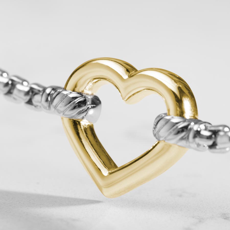 Detailed image of Rose Gold open heart centerpiece on a silver box chain