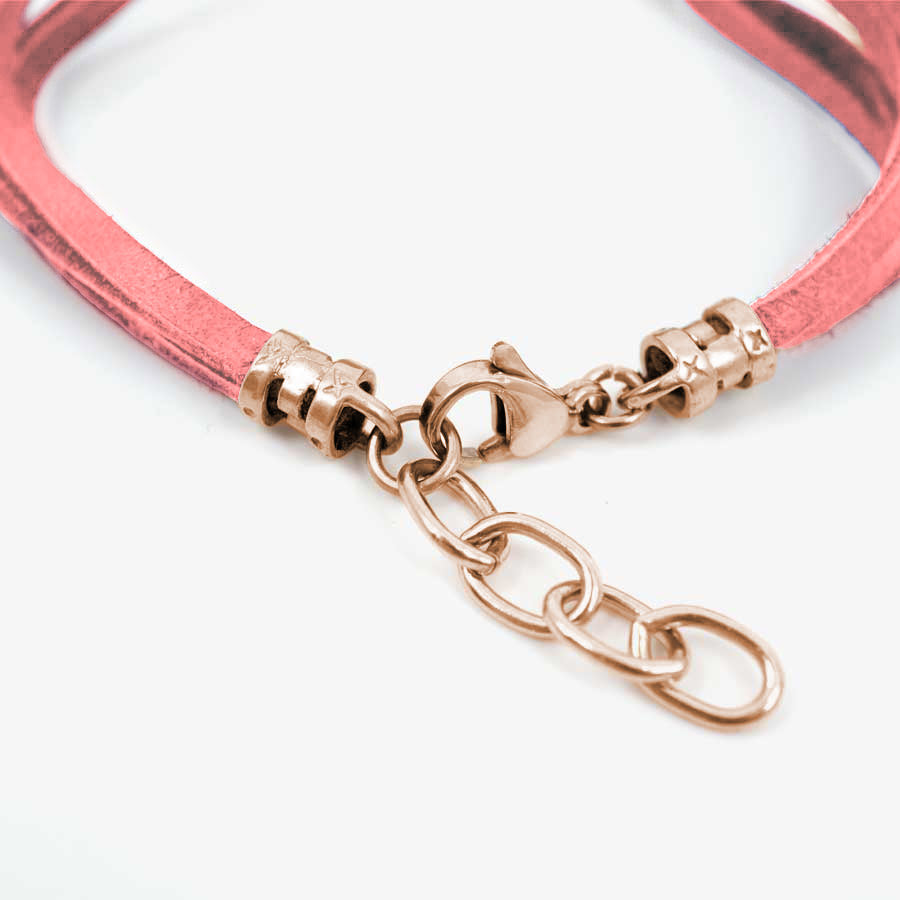 Rose gold medical ID bracelet clasp attached to pink leather