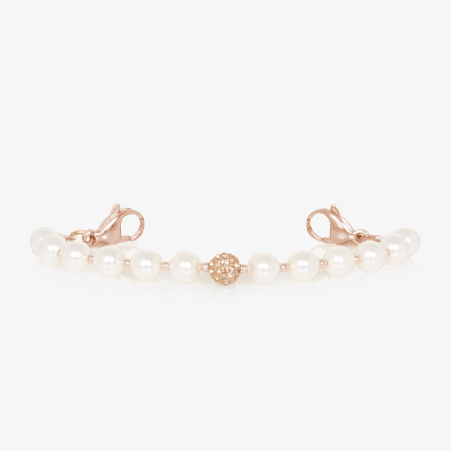 Pearl and rose gold tone stretch medical ID bracelet with sparkly rose gold tone centerpiece.