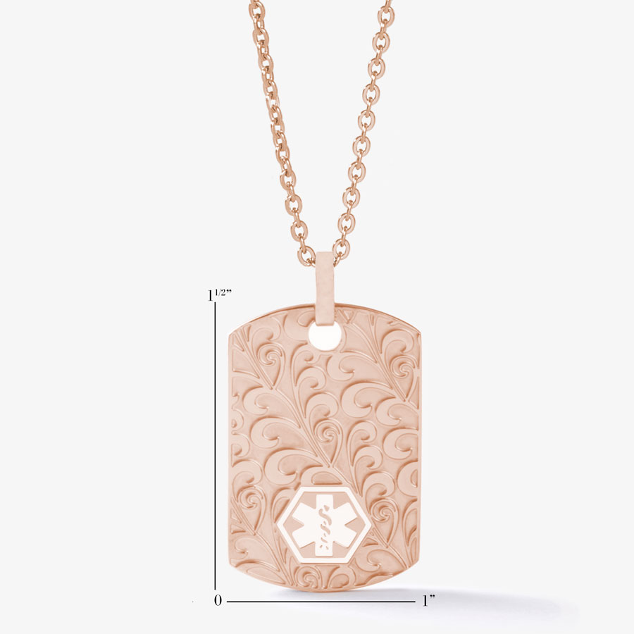 1” x 1-½” scale of Rose Gold Tone Filigree Dog Tag Necklace, plated stainless dog tag with intricate scroll design on a chain