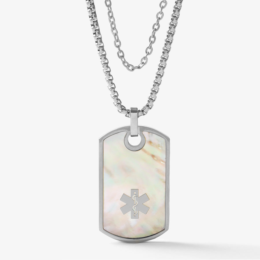 Silver tone medical ID dog tag with mother of pearl inlay and silver tone medical symbol on a silver tone chain layered with accent chain.