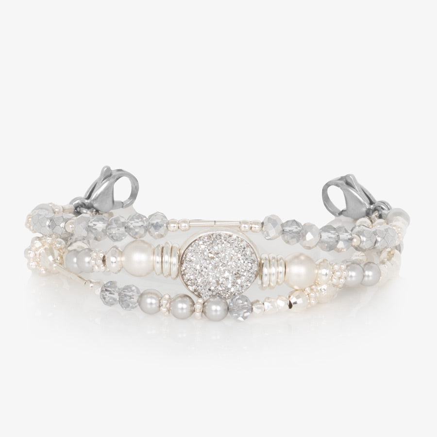 Three strands of silver and crystal beads on a beaded medical ID bracelet