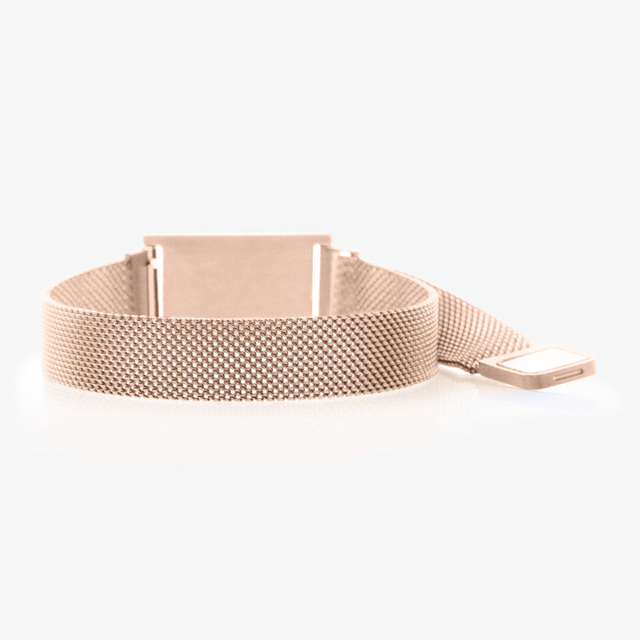 The back side of the rose gold tone stainless steel medical ID bracelet with adjustable mesh band and magnetic clasp opened.