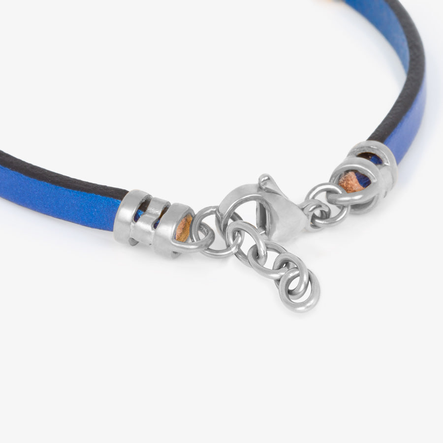 Silver tone adjustable chain affixed to navy blue leather medical ID bracelet.