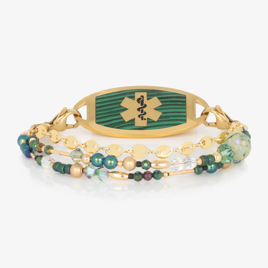 Gold and green beaded multi-strand and chain medical ID bracelet paired with gold tone stainless steel medical ID tag with malachite inlay and gold tone medical symbol at the center.