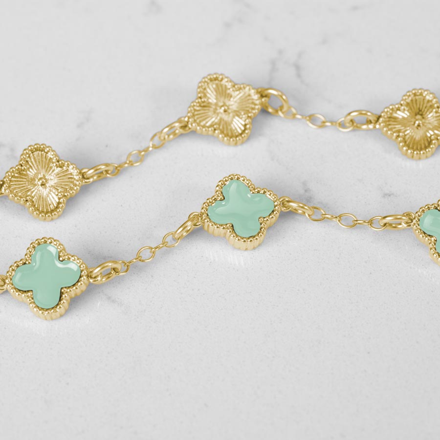 Detail Image showing CLover Shaped links with Gold Texture on back and mint enamel on front.