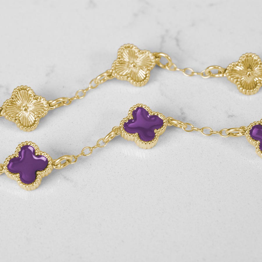 The Front and backside of the 12k gold plated clover shaped medical ID bracelet.