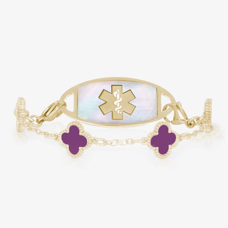 12k gold plate clover shaped medical ID bracelet with berry inlay paired with gold tone stainless steel medical alert tag with lilac abalone inlay.