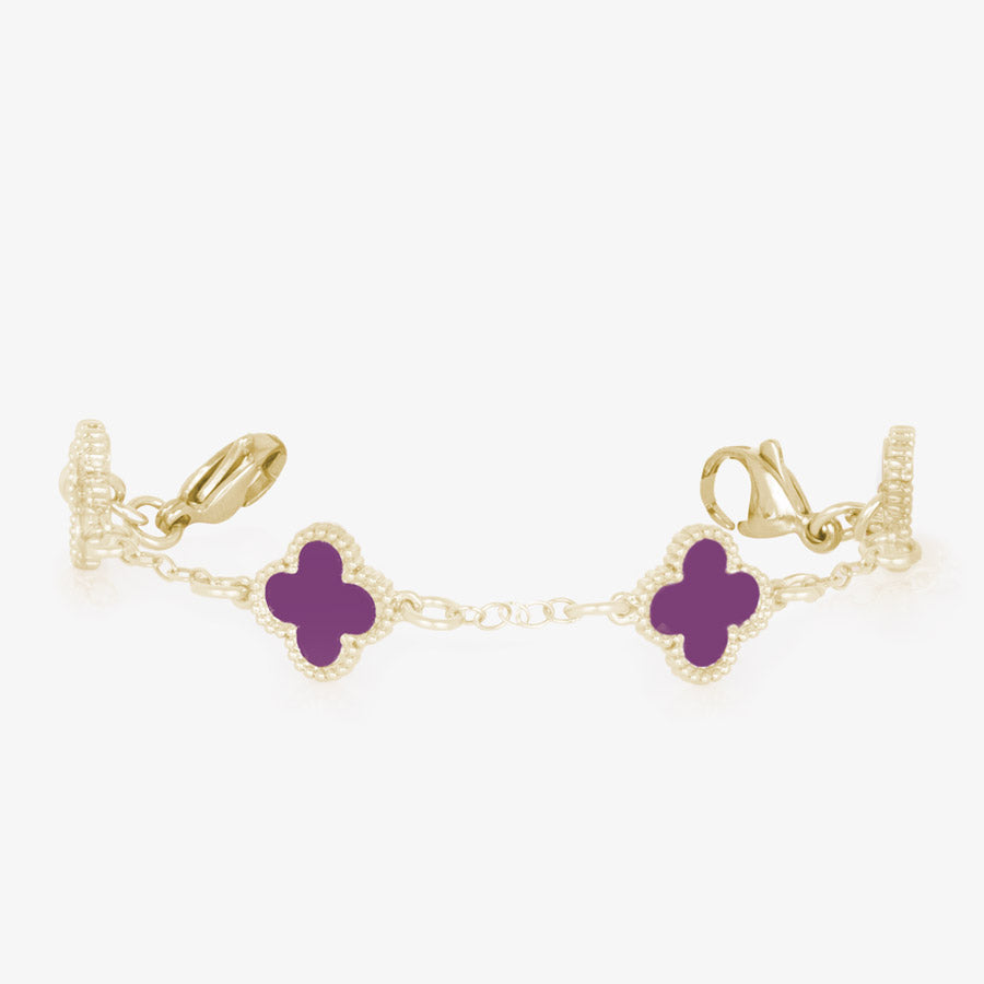 12k gold plated clover shaped medical alert bracelet with berry inlay finished with gold tone stainless steel lobster clasps at each end.