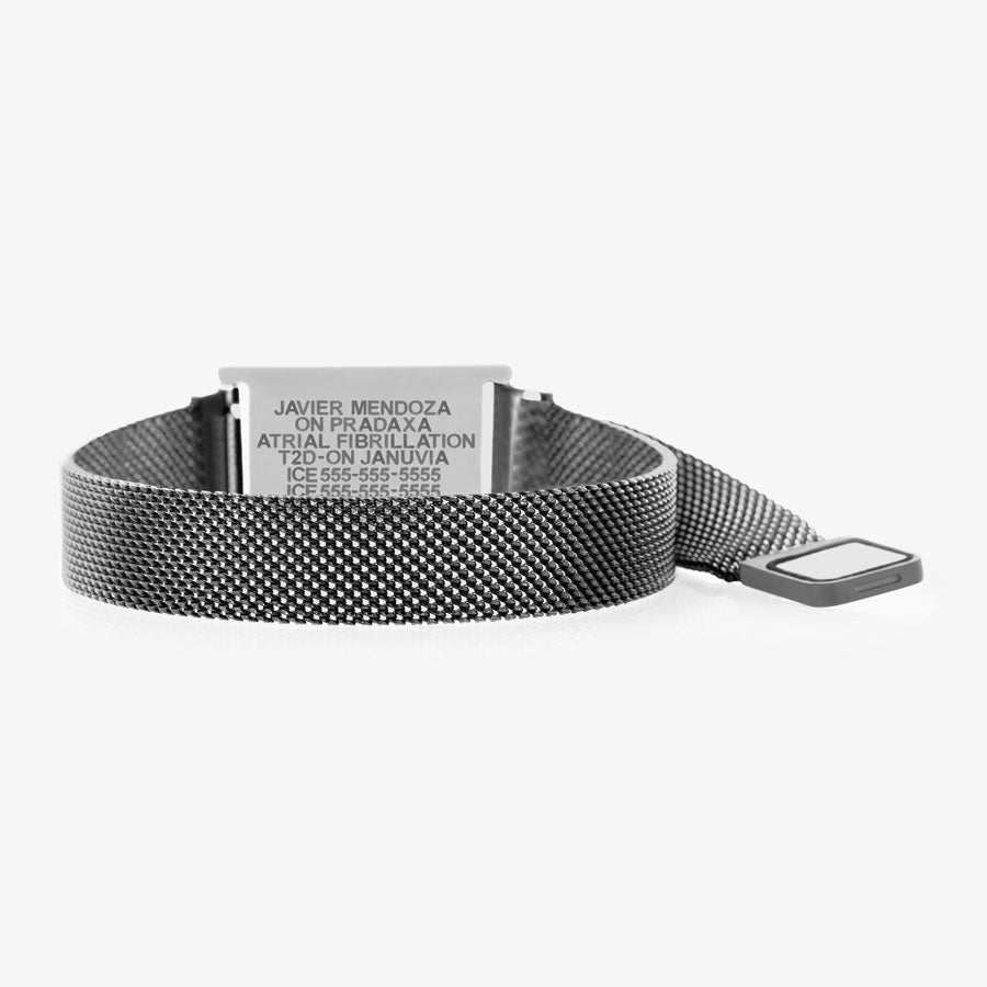 The back side of the black stainless steel medical ID bracelet with adjustable mesh band and magnetic clasp opened.