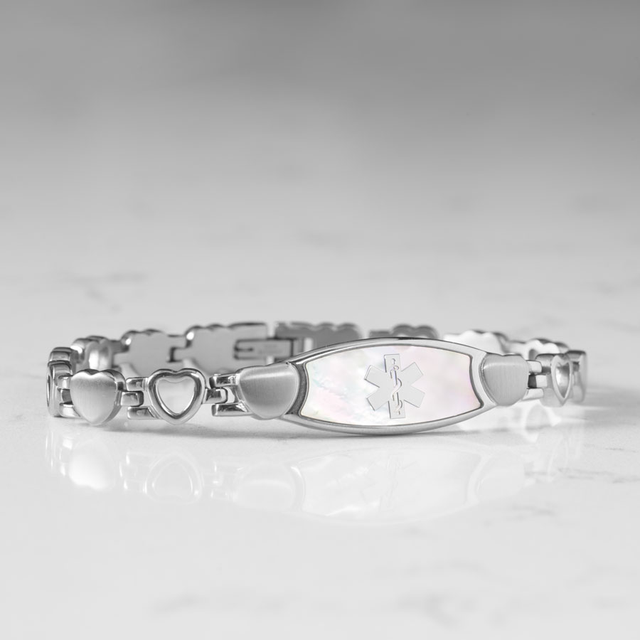 Feminine stainless steel linked bracelet with mother of pearl inlay medical ID tag