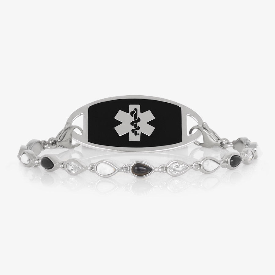 Rhodium and palladium plated medical ID bracelet with alternating teardrop links of black onyx, white howlite and clear cubic zirconia and medical ID tag