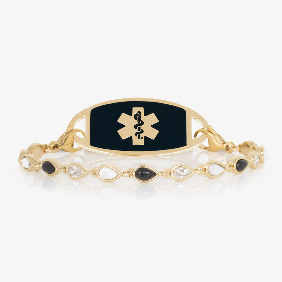 12K gold plated medical ID bracelet with alternating teardrop links of black onyx, white howlite and clear cubic zirconia and medical ID tag