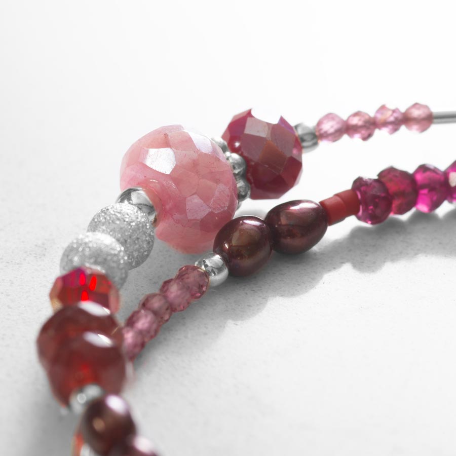 Close up images of red and pink beads