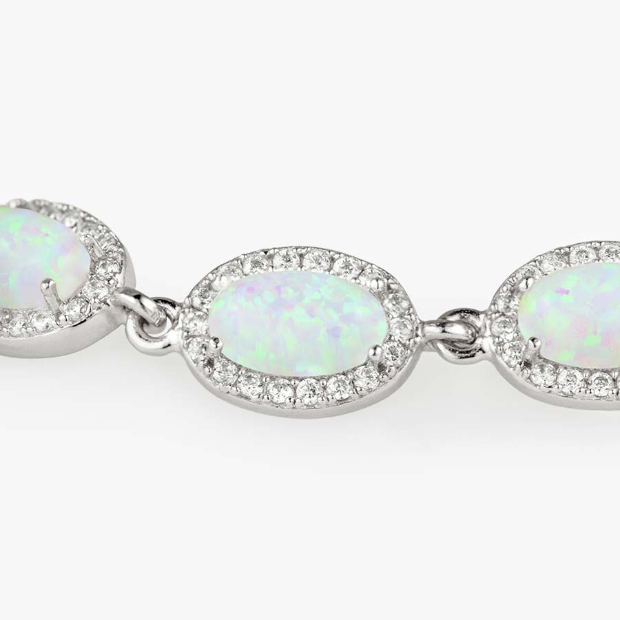 Close-up of the natural oval-shaped opal links with cubic zirconia accents on the Opal Medical ID Bracelet in Sterling Silver