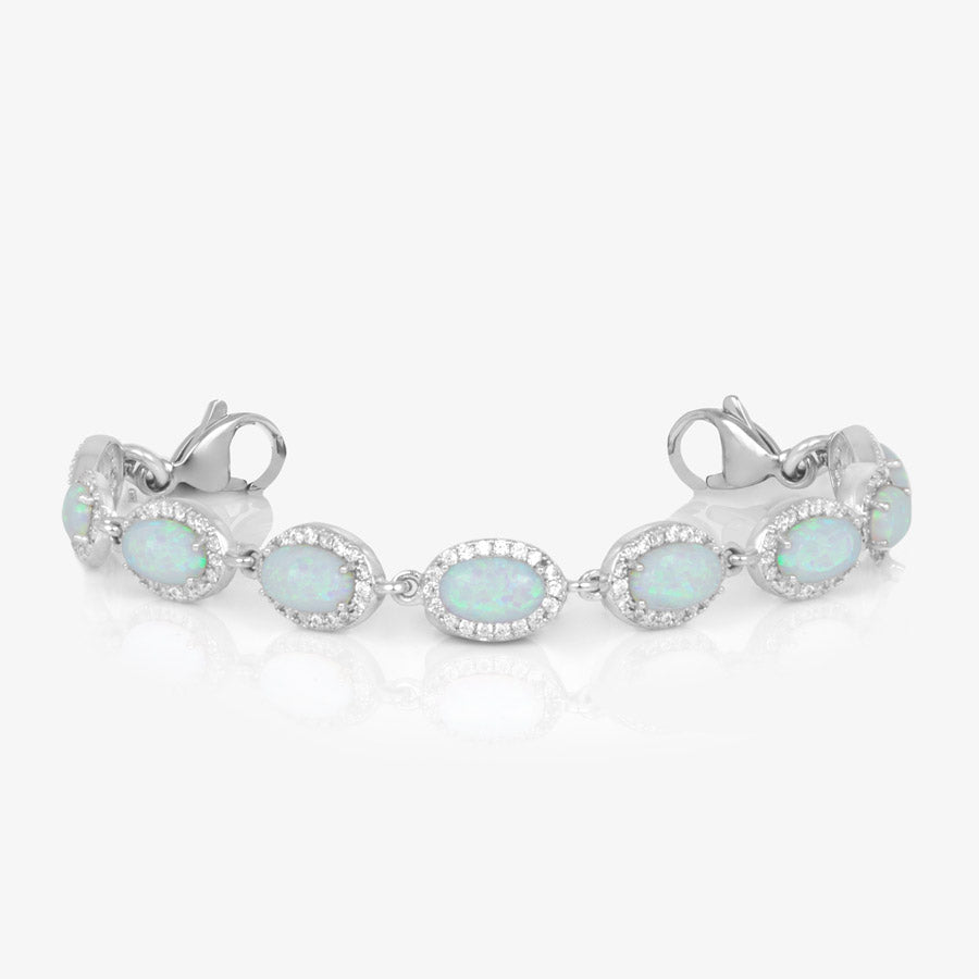 Opal Medical ID Bracelet in Sterling Silver. Oval-shaped opals, cubic zirconia, with silver-dipped lobster clasps on each end