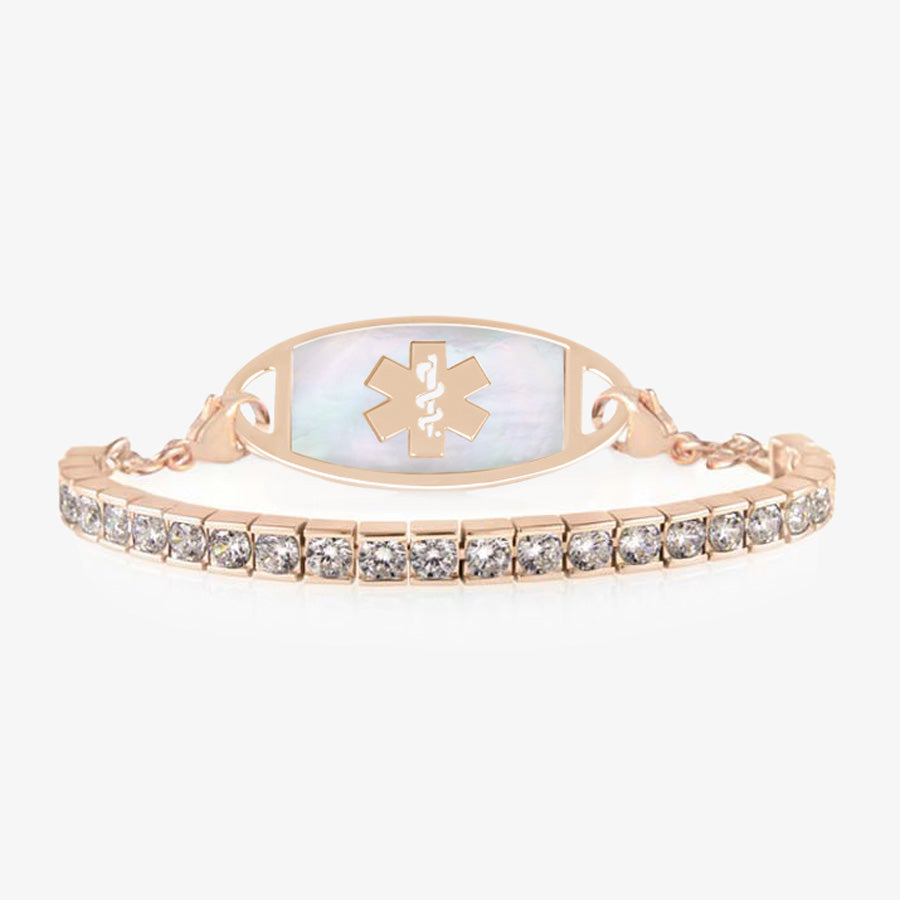 Rose gold tone medical ID tennis bracelet with pave set cubic zirconia crystals paired with decorative rose gold tone stainless steel med ID tag with white medical symbol.