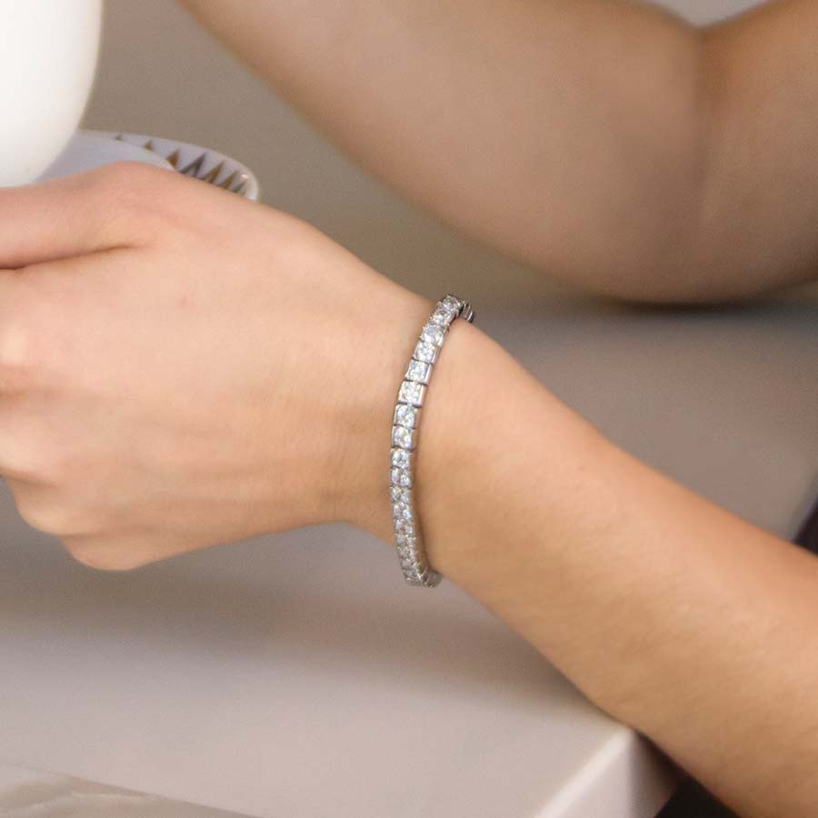 Woman wearing sterling silver Audrey Medical ID Tennis Bracelet