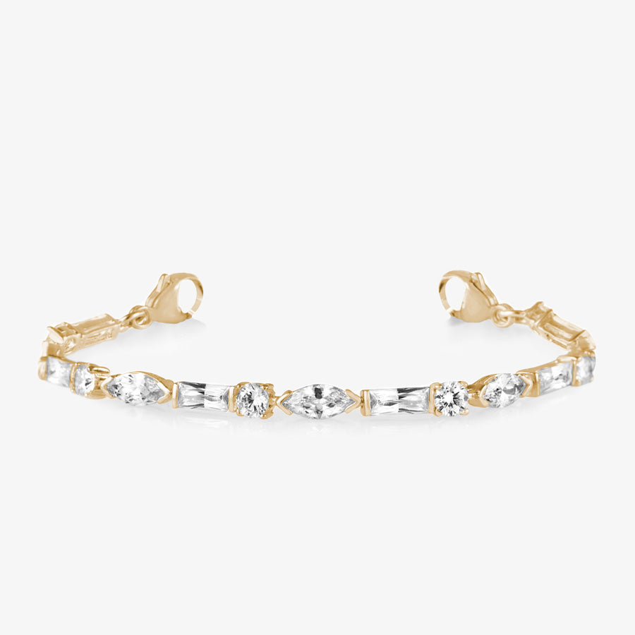 12 karat gold plated med ID tennis bracelet with round, oval, and rectangle clear cubic zirconia crystals and gold tone lobster clasps.