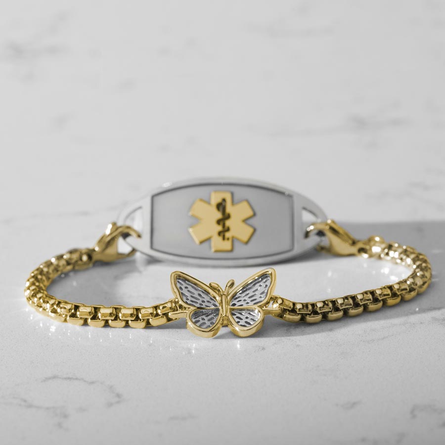 12k gold plated medical ID bracelet featuring a linked chain and gold plated butterfly centerpiece with decorative silver details