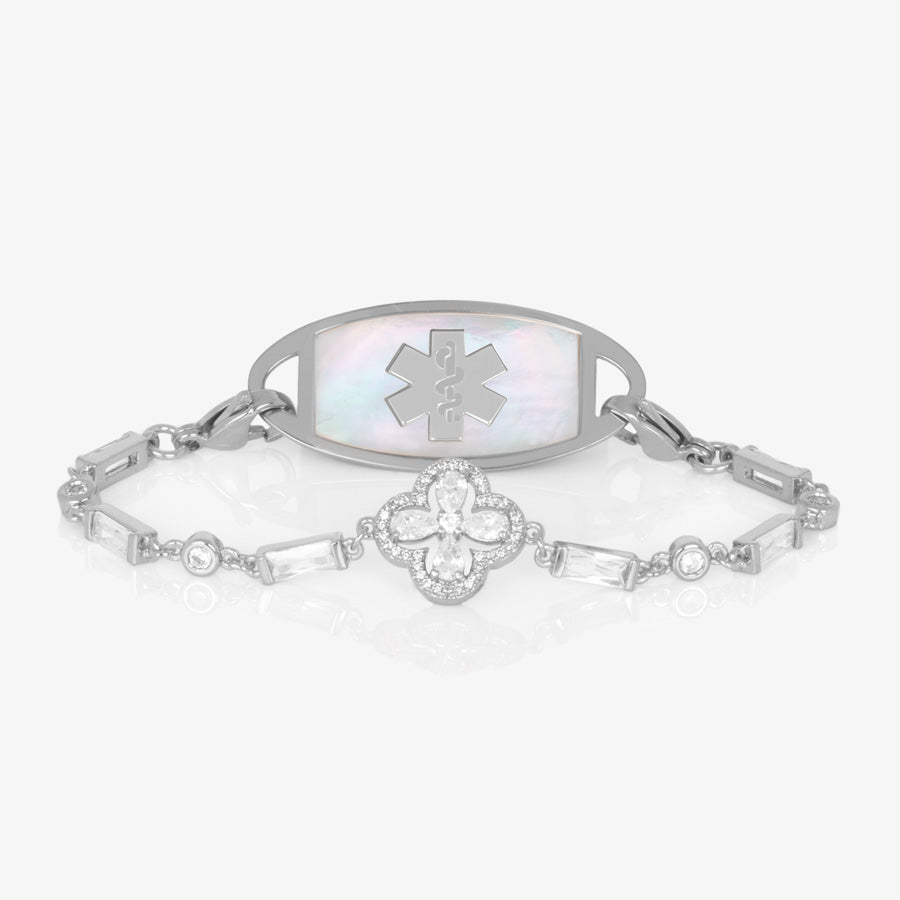 Rhodium plated medical ID bracelet with decorative cubic zirconia links and clover shaped centerpiece and stainless steel medical ID tag with mother of pearl inlay