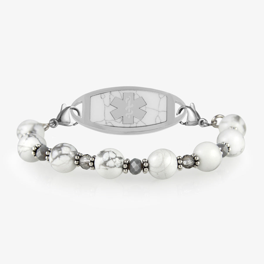 White marbled beaded stretch medical ID bracelet paired with stainless steel medical ID tag with howlite inlay and silver tone medical caduceus symbol.