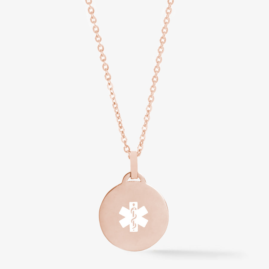 Rose gold circle pendant medallion necklace with white medical caduceus symbol