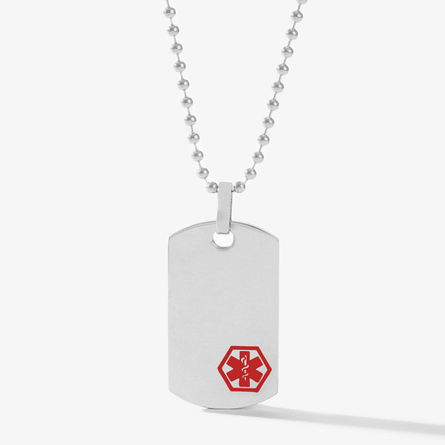 Stainless steel dog tag attached to stainless steel ball chain. Dog tag has red medical symbol on front. 