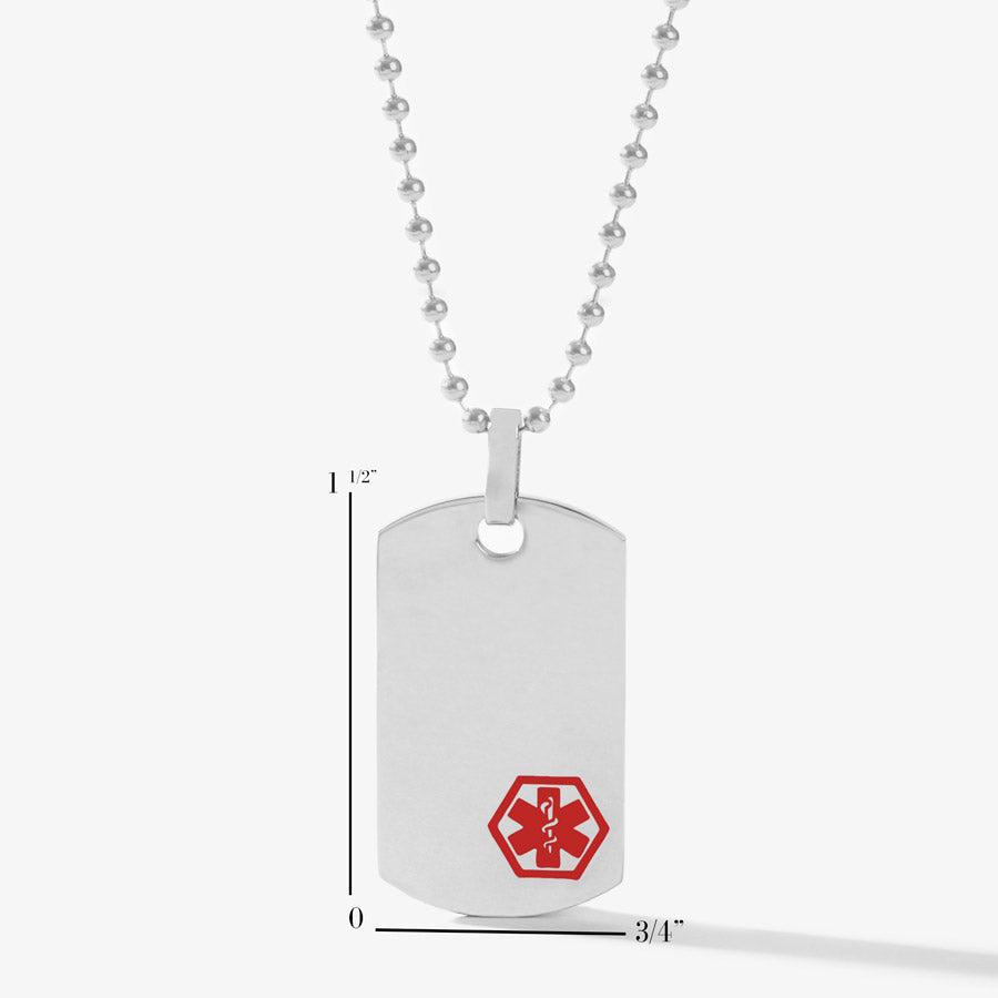 Scale of the ¾” x 2” Red Mini Medical Dog Tag Necklace. A silver-tone stainless dog tag with red caduceus on a 24-inch ball chain