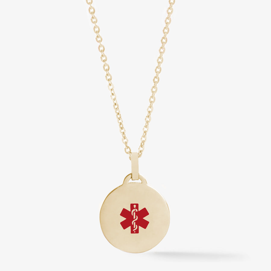 Gold circle pendant medallion necklace with red medical caduceus symbol