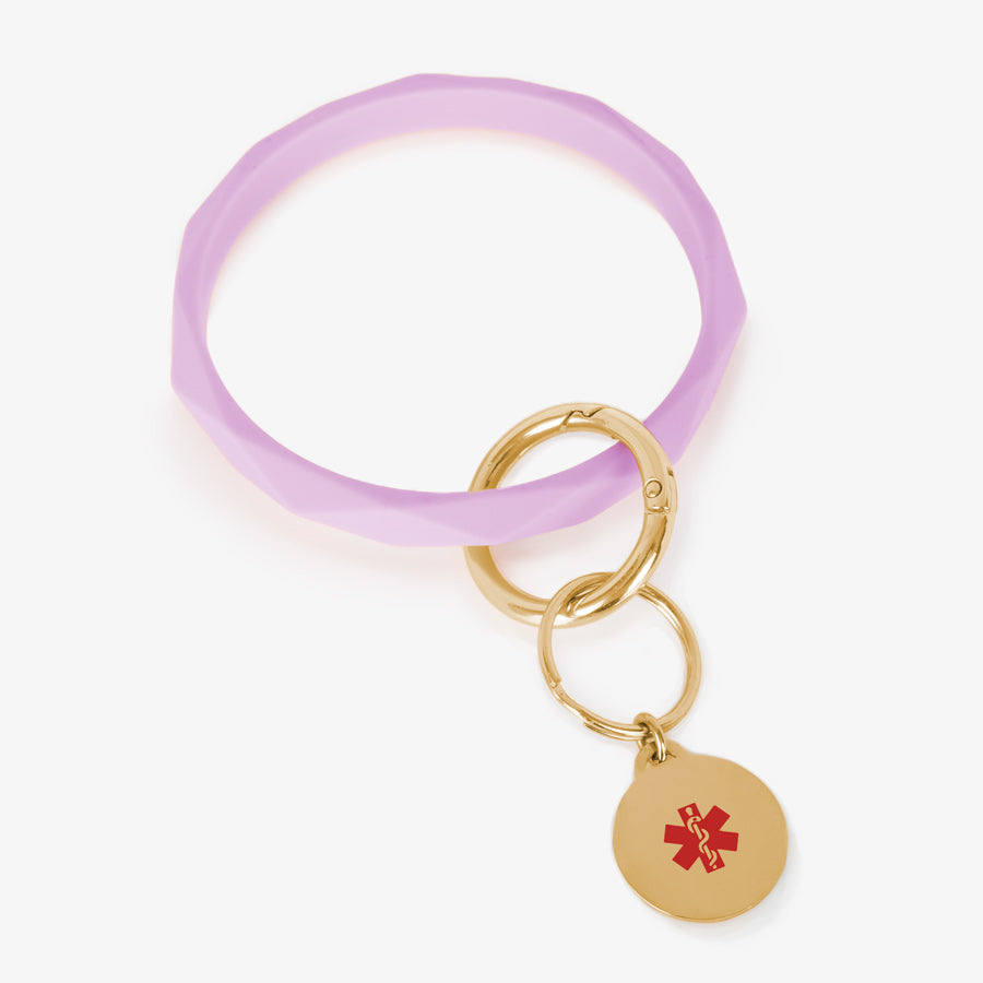 Lilac faceted silicone medical ID key ring wristlet with gold tone stainless steel medical alert charm.