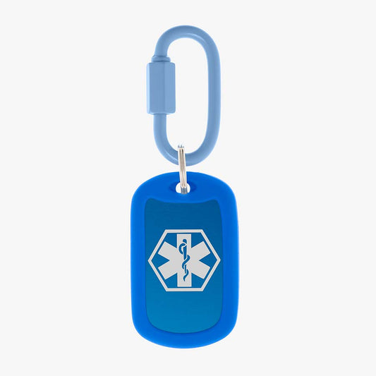 Royal blue aluminum bag tag with white medical symbol and coordinating silicone silencer on matching carabiner clip.