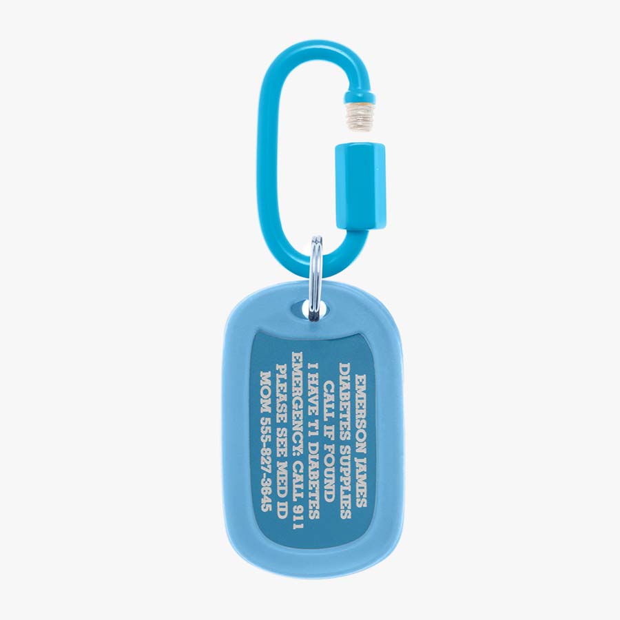 Sky blue aluminum bag tag with engraving example and coordinating silicone silencer on matching carabiner clip.